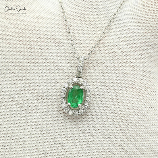 diamond halo emerald pendant