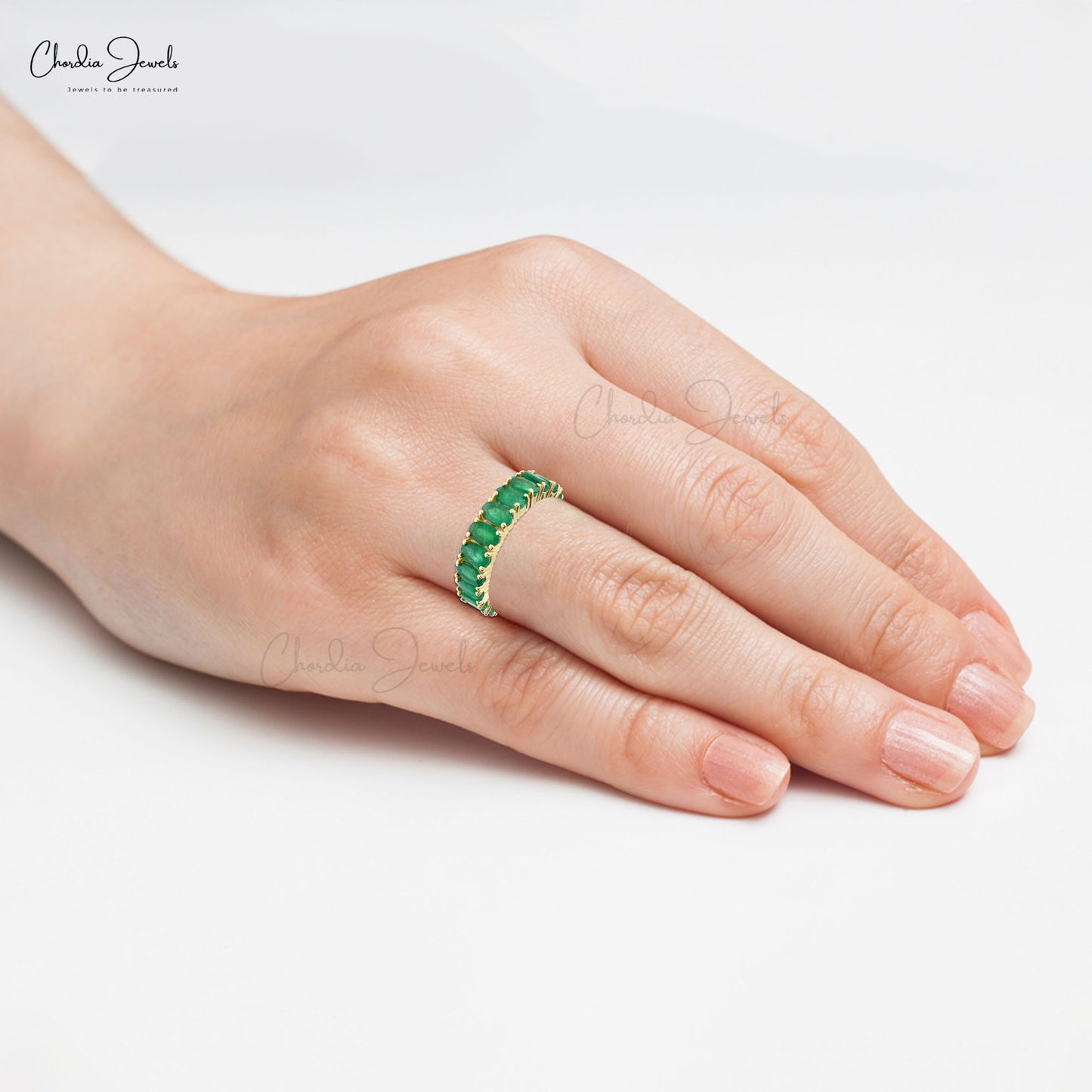 Indulge in the luxury of our prong set emerald ring.