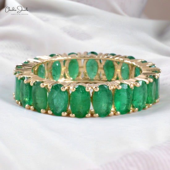 Captivate hearts with our dainty emerald ring.