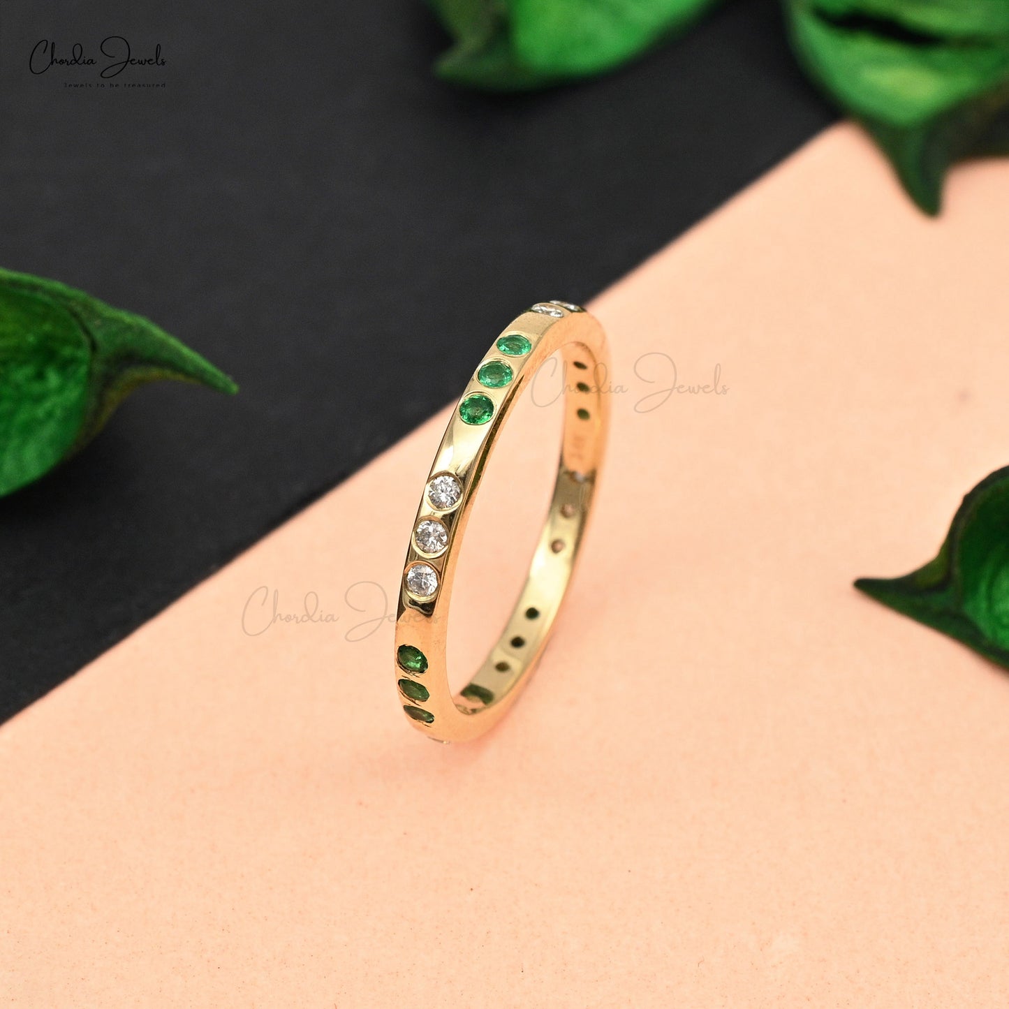 Elevate your elegance with this emerald and diamond ring.