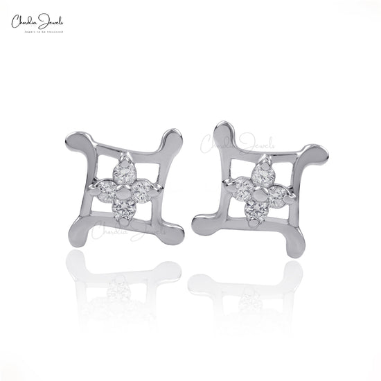 Adorn yourself with these diamond stud earrings.
