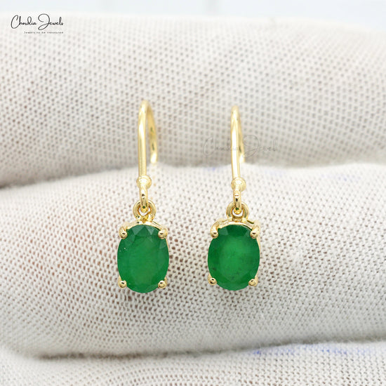Discover the perfect blend of style with Oval Emerald Earrings