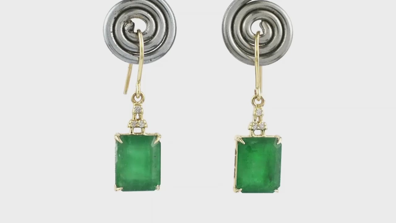 Load and play video in Gallery viewer, Adorn yourself with these emerald and diamond earrings.
