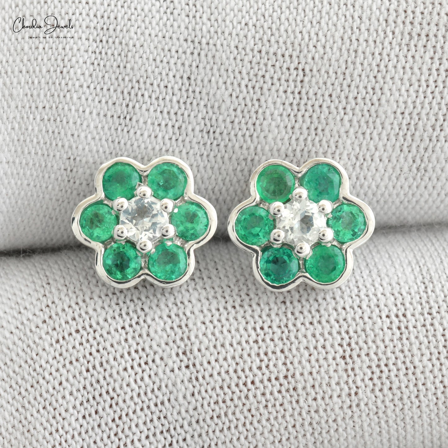 Adorn yourself with our emerald and topaz earrings.