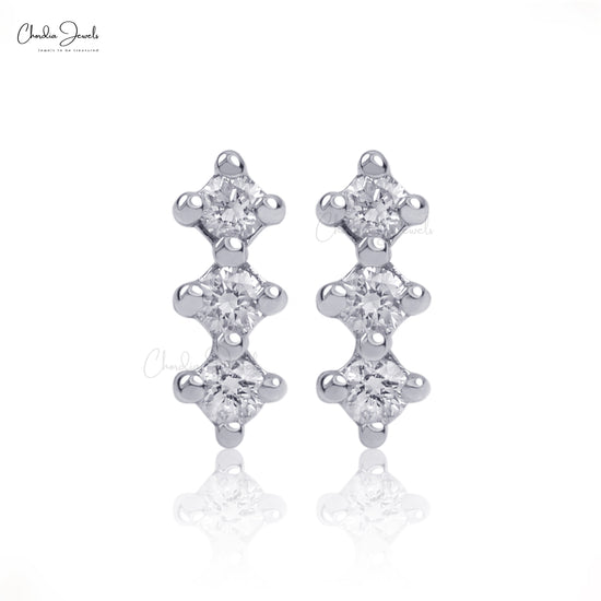 Transform your style with our diamond three stone studs.