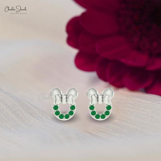 Embrace the allure of timeless beauty with these emerald kids earrings.
