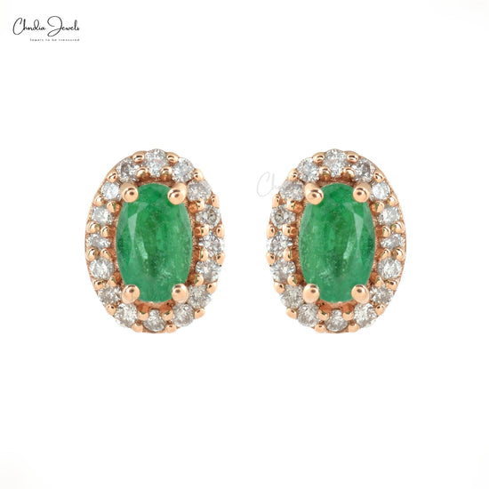 green stone earrings in gold