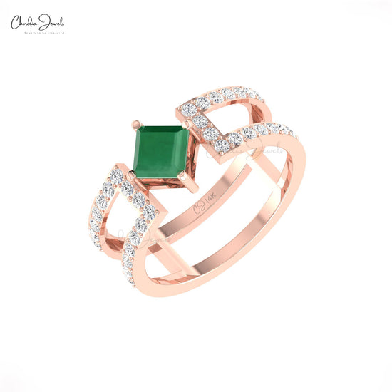 Elevate your overall look with this emerald and diamond parallel split shank ring.
