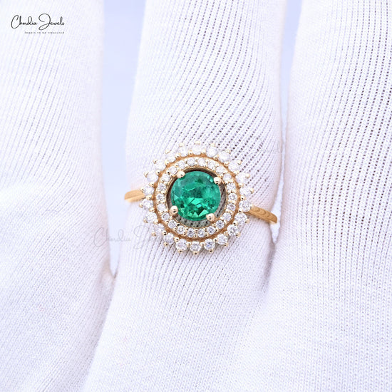 Complete your overall look with our emerald cocktail ring.
