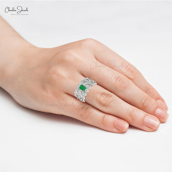 Indulge in the luxury of our emerald and diamond ring.
