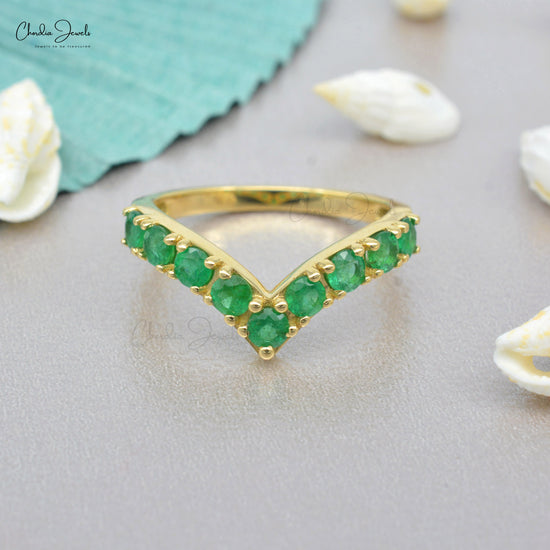 Make every moment memorable with our emerald v-shaped ring.