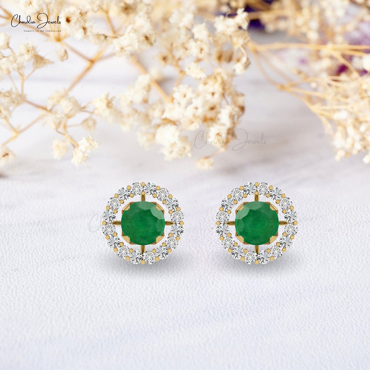 Make a statement with these emerald halo earrings.