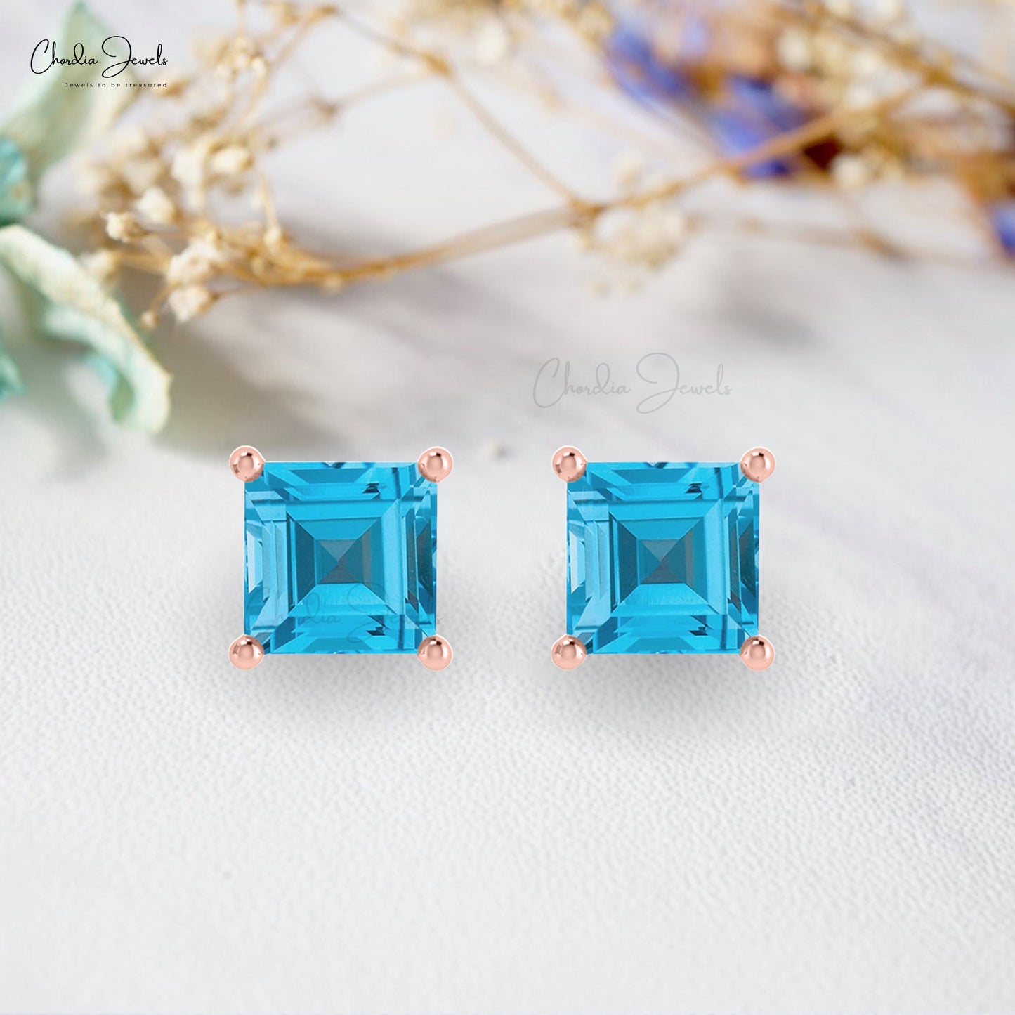 swiss topaz solitaire earrings