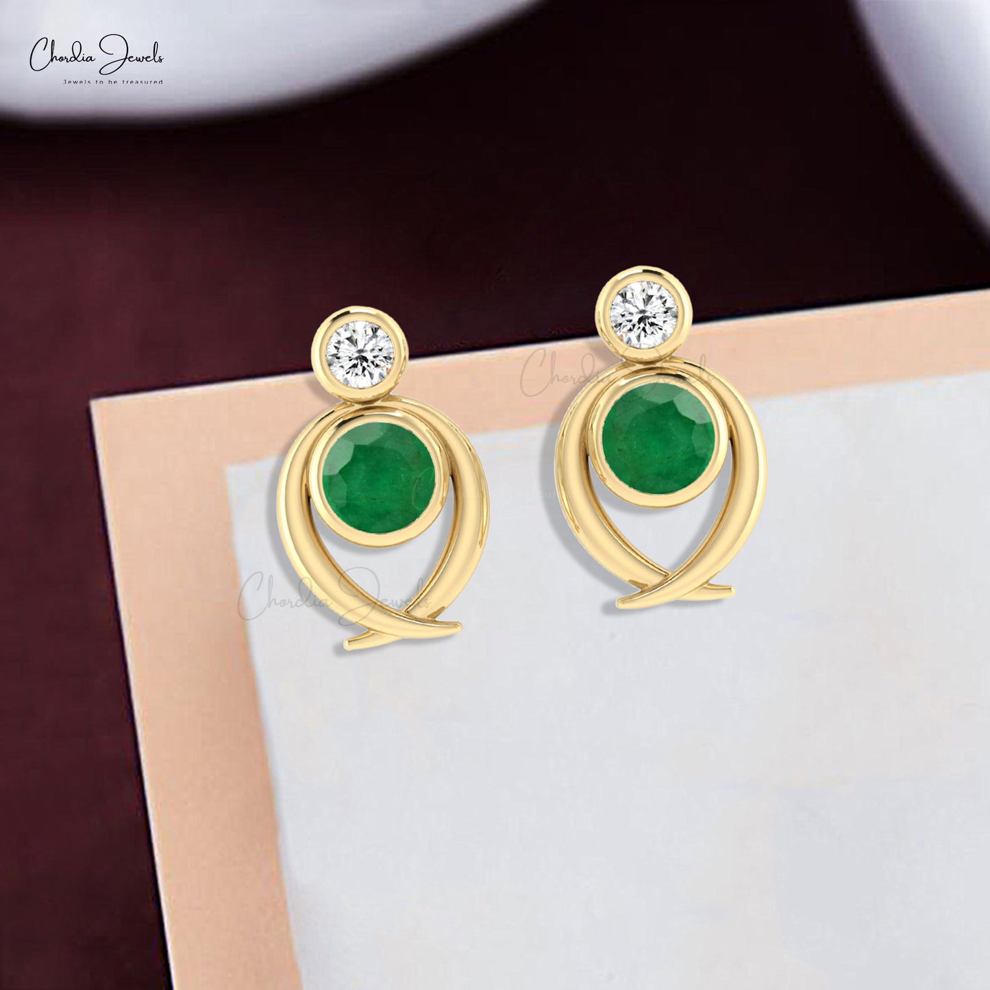 Adorn your ears with emerald stud earrings. 