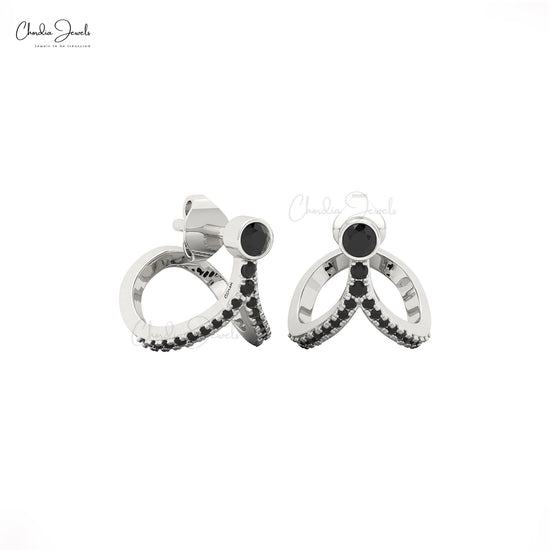 Handmade fine jewelry curved gold earrings with bezel set black diamond stones