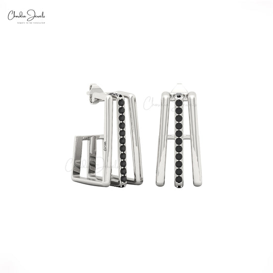 Elegant solid gold geometric earrings with natural black diamond accents