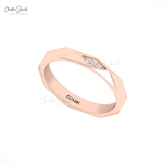 Modern faceted gold band with diamonds