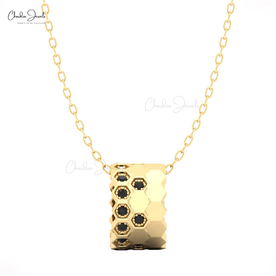 14k solid Gold with a hexagonal pendant featuring black stones by chordia jewels