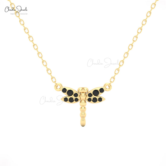 Black diamond dragonfly pendant necklace in yellow gold by Chordia Jewels.