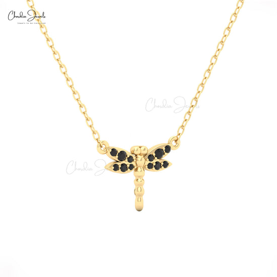 Elegant yellow gold necklace with black diamond dragonfly pendant by Chordia Jewels.