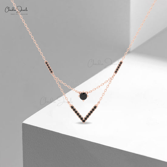 Chveraon 14k solid gold necklace featuring black diamonds.