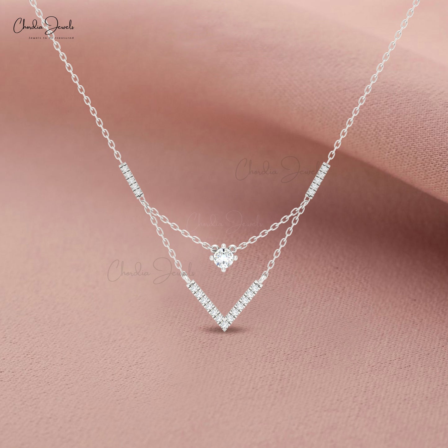 Minimalist V-shaped necklace with diamonds by Chordia Jewels.