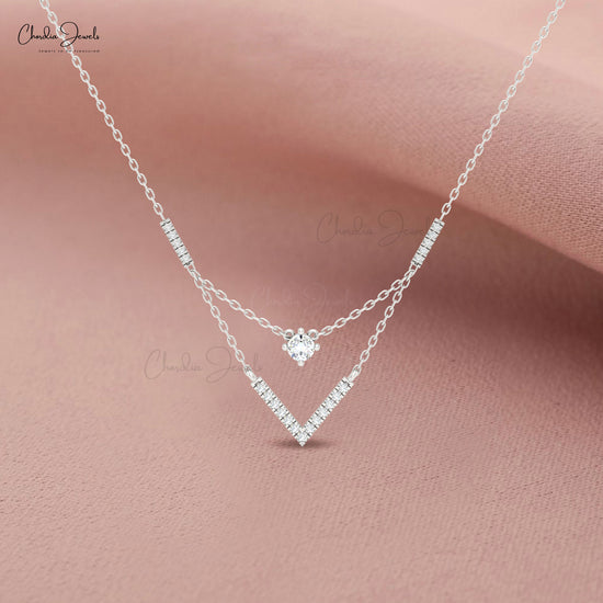 Minimalist V-shaped necklace with diamonds by Chordia Jewels.