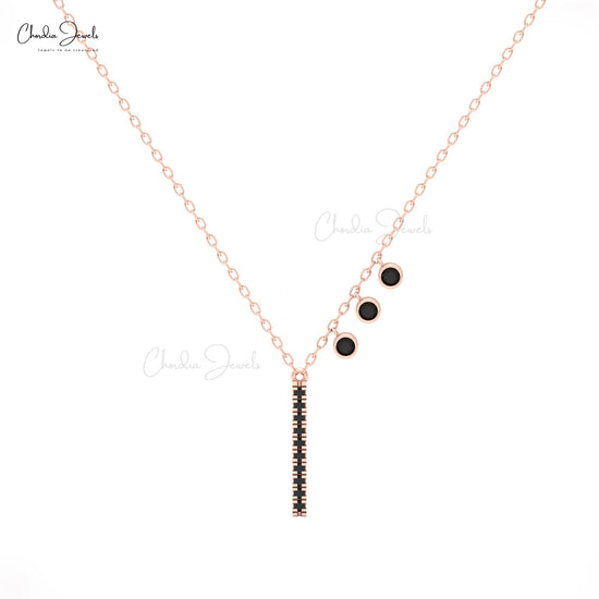 Elegant asymmetrical necklace with black diamond accents