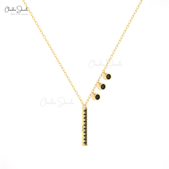14k gold necklace with vertical bar and black diamonds