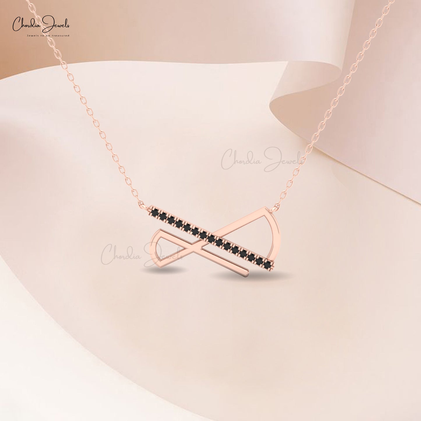 14k solid gold diamond bar necklace for women with black diamond detailing by Chordia Jewels.
