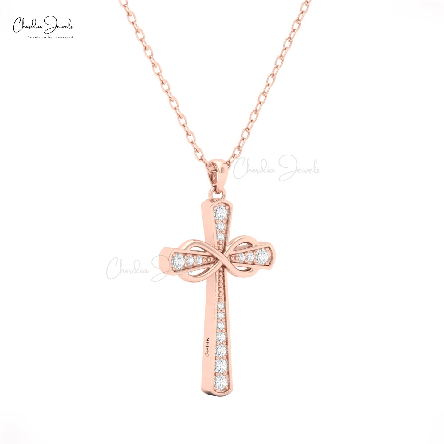 14k solid gold cross pendant for women with white diamonds and ribbon-style detailing by Chordia Jewels.