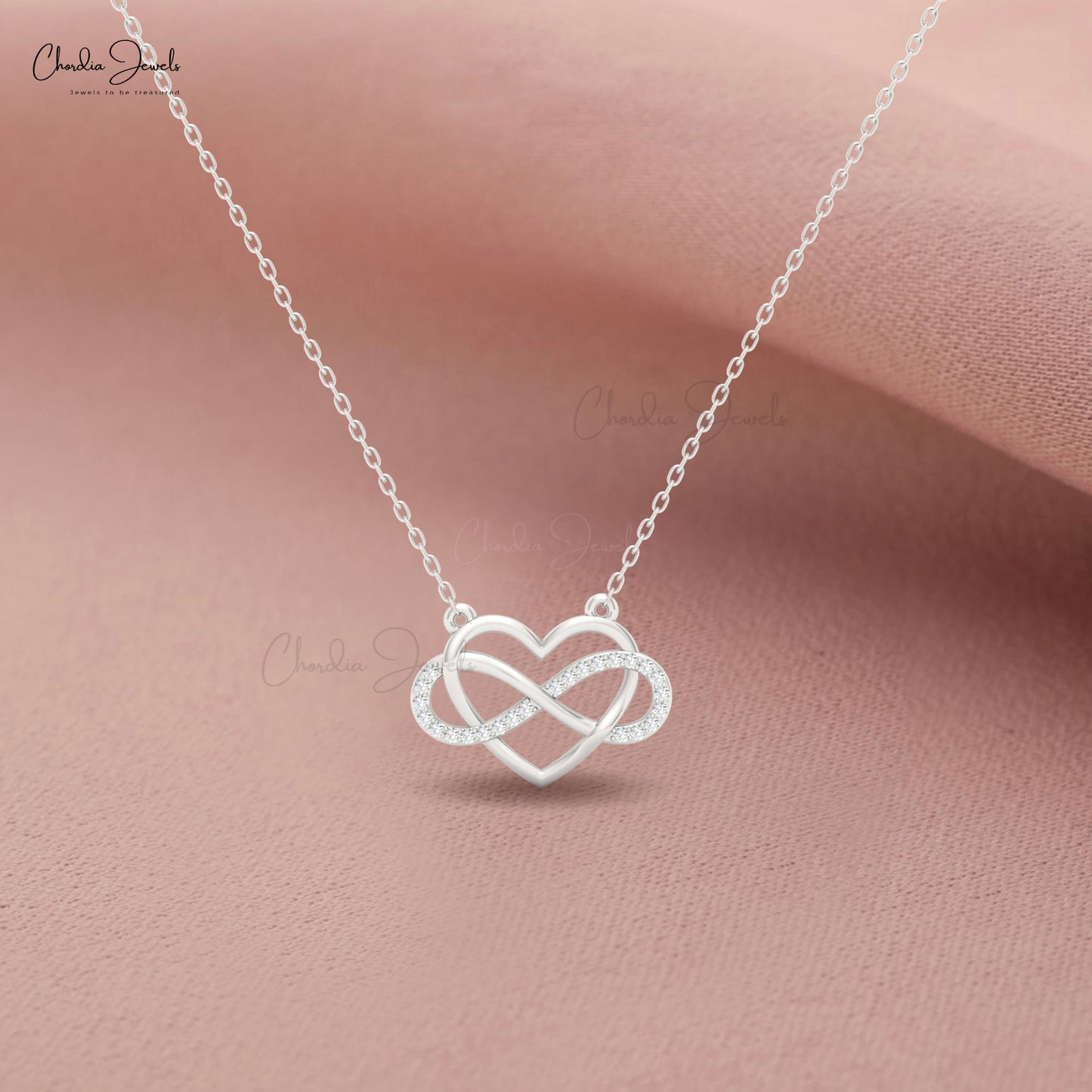 Minimalist white diamond necklace with gold infinity charm