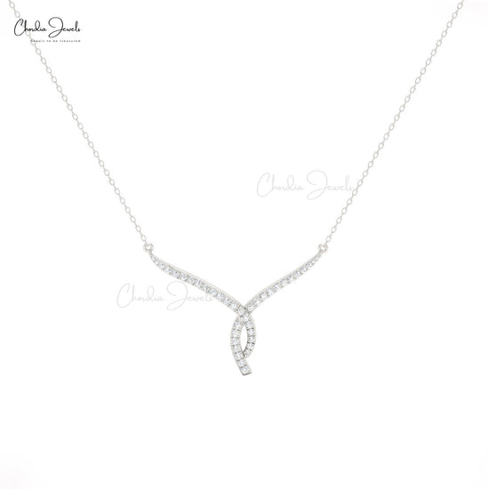 Luxurious twisted V-shaped necklace in 14K gold with white diamonds, perfect for weddings.