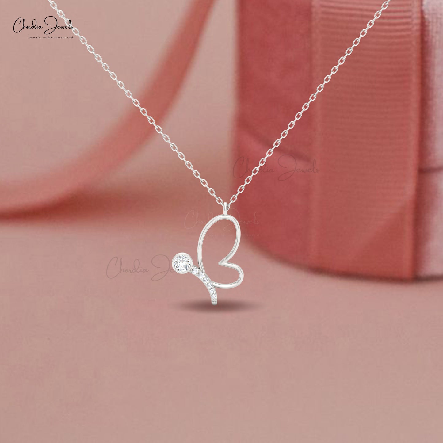 14K solid gold butterfly charm necklace featuring a 16mm white diamond
