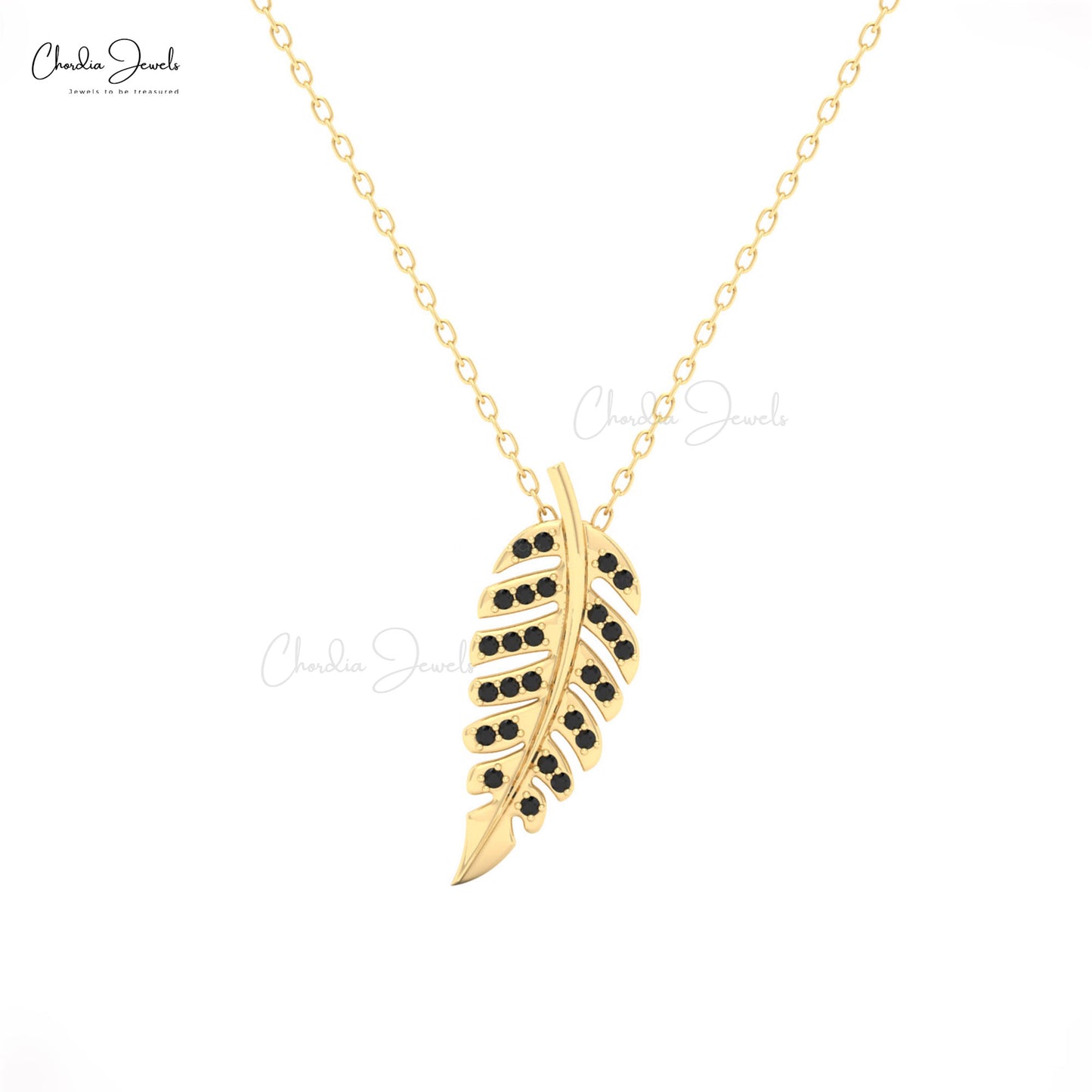 Gold leaf-shaped pendant with black stones on a gold chain for women