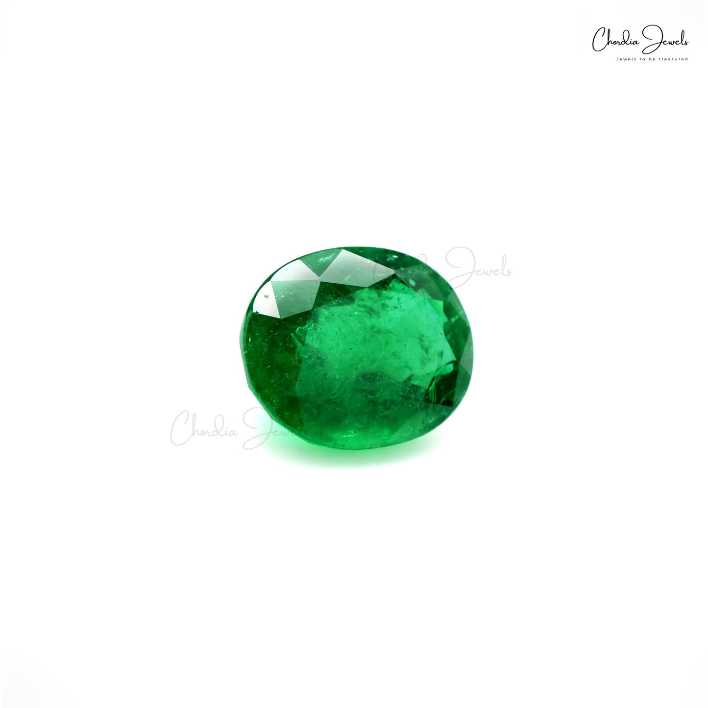 Oval cut Zambian emerald loose gemstone photo – Chordia Jewels