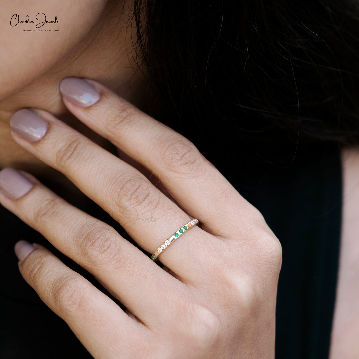 Step into the world of elegance with this emerald flush set ring