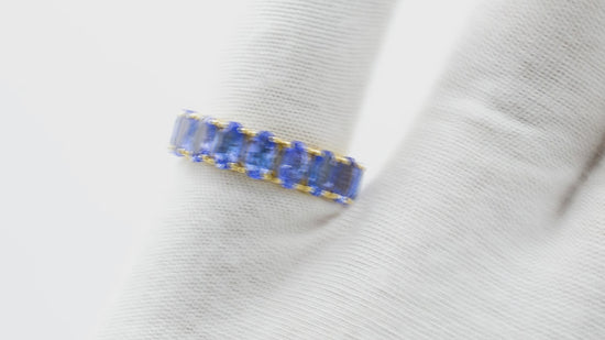 Load and play video in Gallery viewer, Solid 14k Yellow Gold Eternity Ring Genuine Tanzanite Gemstone Shared Prong Set Promise Ring
