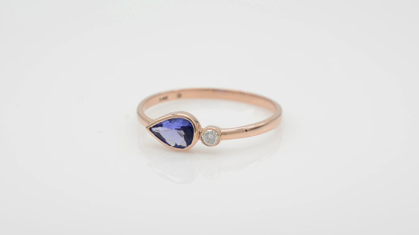 Load and play video in Gallery viewer, Real 14k Rose Gold Two Stone Band Natural 0.48ct Tanzanite &amp;amp; Diamond Bezel Set Wedding Ring
