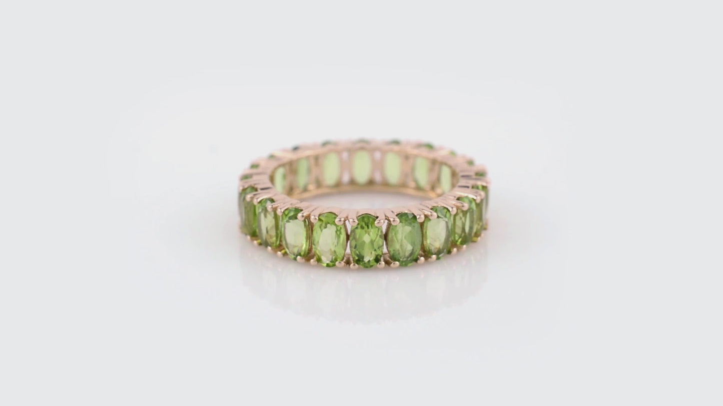 Load and play video in Gallery viewer, Genuine Peridot Eternity Band 5x3mm Oval Cut Gemstone 14k Solid Rose Gold Eternity Ring August Birthstone For Her
