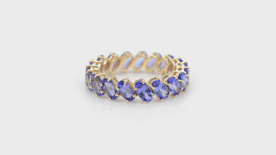 Load and play video in Gallery viewer, Stackable Eternity Ring With Tanzanite Gemstone 14k Solid Gold Prong Set Engagement Ring

