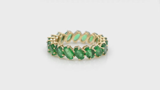 Load and play video in Gallery viewer, Emerald Eternity Band Ring in 14k Solid Yellow Gold Oval Cut Emerald Jewelry
