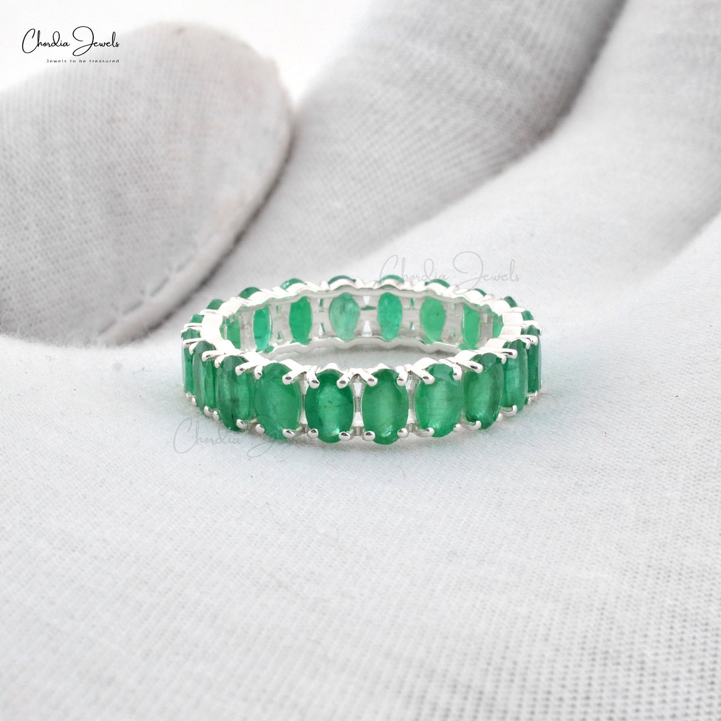 Emerald Eternity Band in14K White Gold.