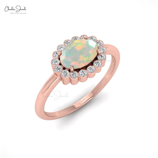 Unique 7x5mm Opal Engagement Ring With Diamond Halo