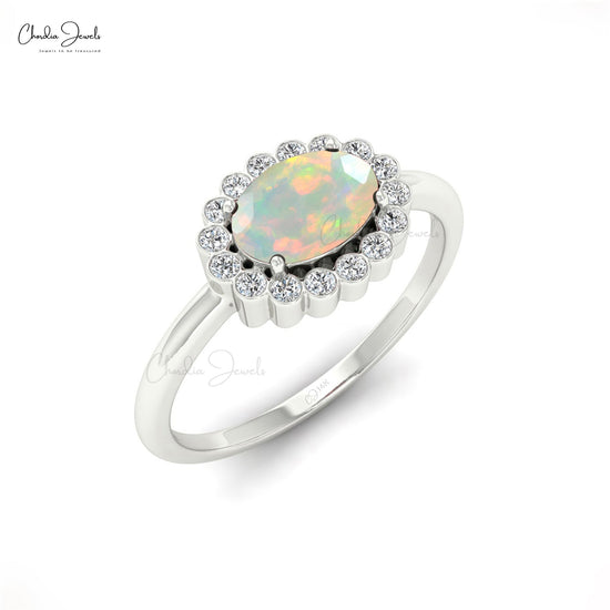 Unique 7x5mm Opal Engagement Ring With Diamond Halo