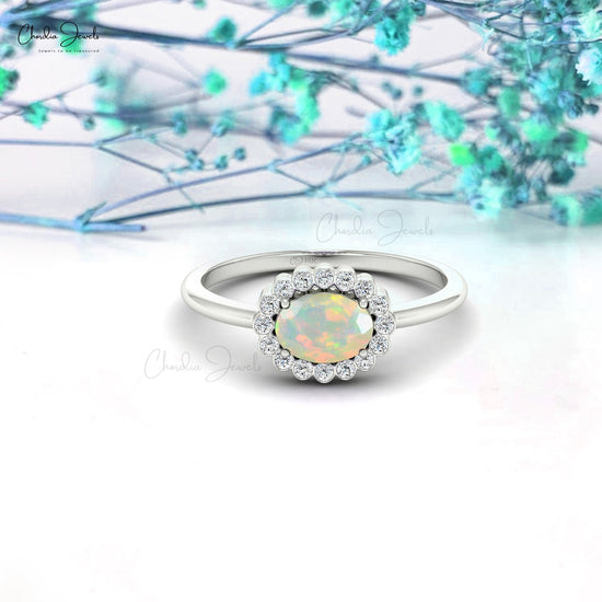 Load image into Gallery viewer, Unique 7x5mm Opal Engagement Ring With Diamond Halo
