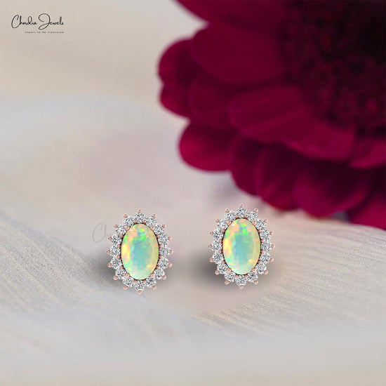 Load image into Gallery viewer, 6x4mm Prong Set Opal And Diamond Oval Halo Earrings
