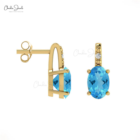 Load image into Gallery viewer, Oval Swiss Blue Topaz Gemstone Earrings in 14K Gold with Round Diamond
