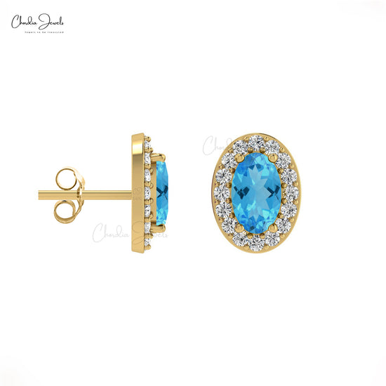 Oval Cut Swiss Blue Topaz & Diamond Halo Earrings in 14K Gold