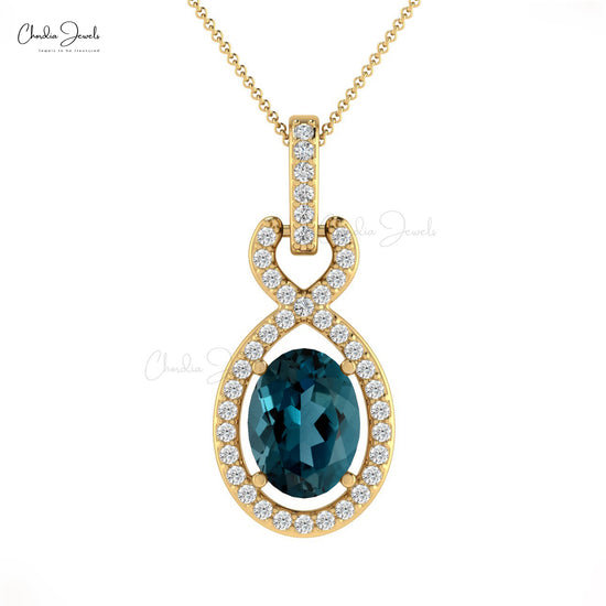 Load image into Gallery viewer, London Blue Topaz Halo Pendant
